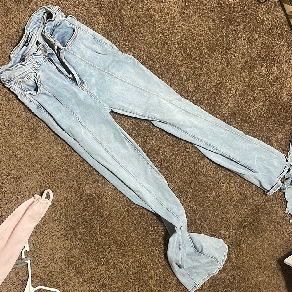 FashionNova Jeans size 3 ripped sides
